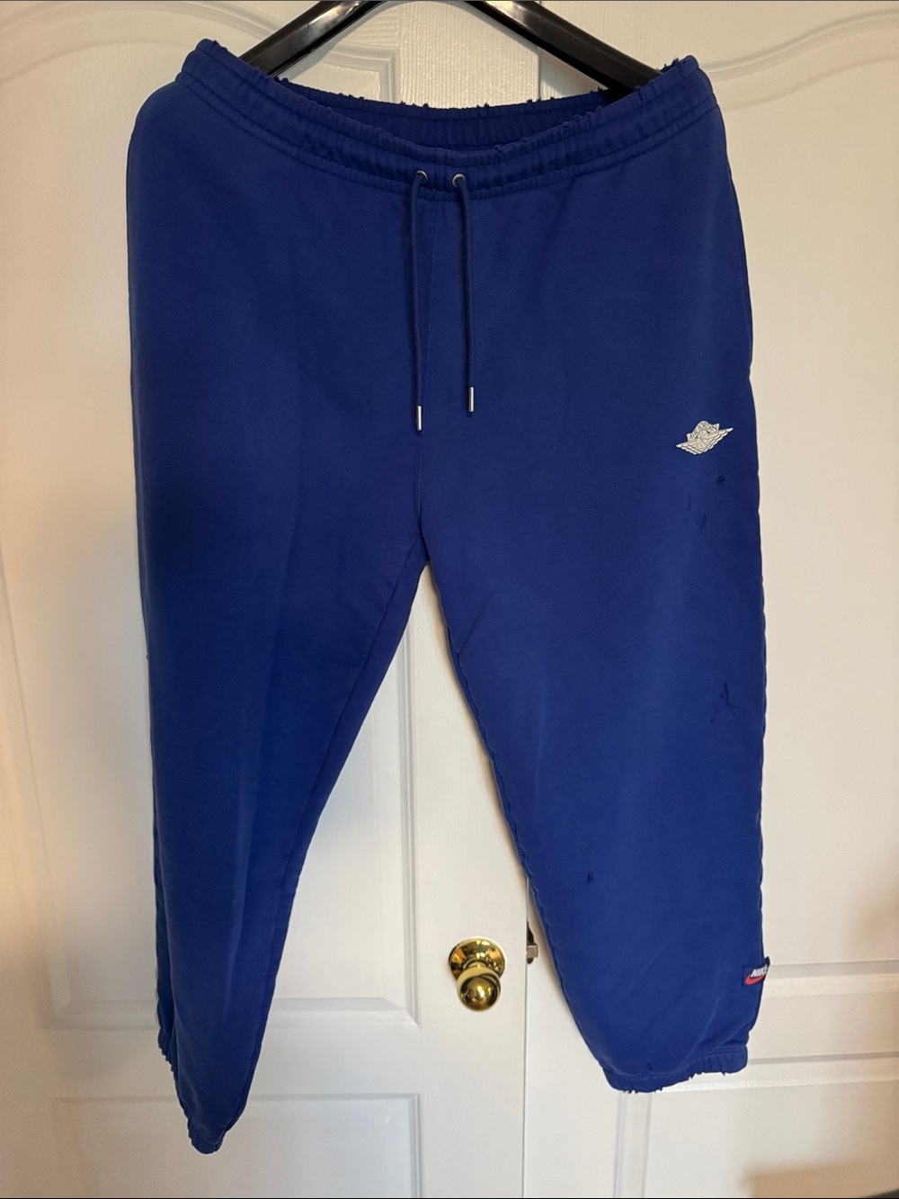 Jordan Nike Blue Athletic Sweatpants with Swoosh Patch - distressed look